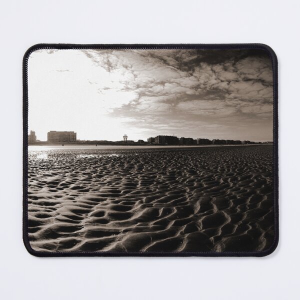 Item preview, Vast Sandy Beach With City Skyline Under Clear Blue Sky in sepia designed and sold by FotoMahieu.