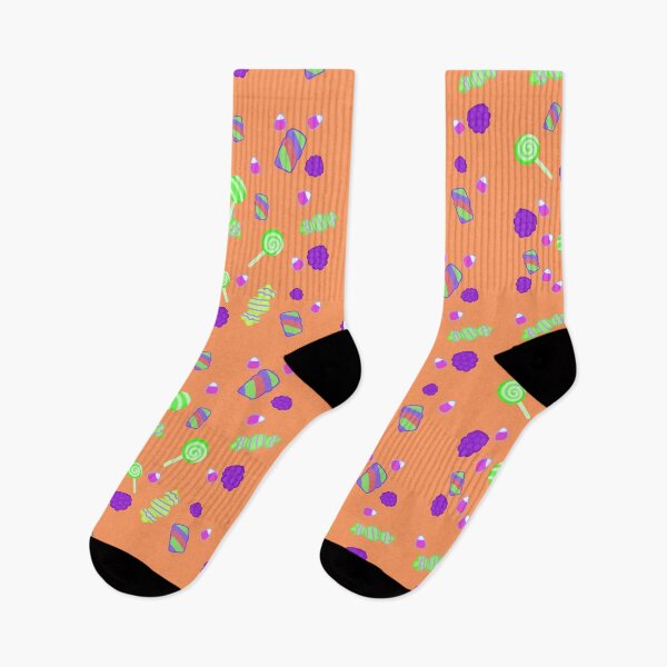 Item preview, Cute Halloween pastel-colored sweets, lollipops, marshmallows in purple and green, on an orange background designed and sold by katecheerycake.