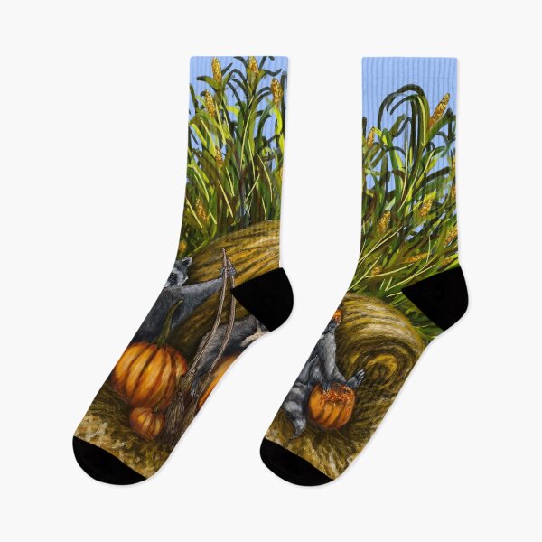 Item preview, Mapaches jugando con calabazas en un campo de maíz designed and sold by Scribblebard.