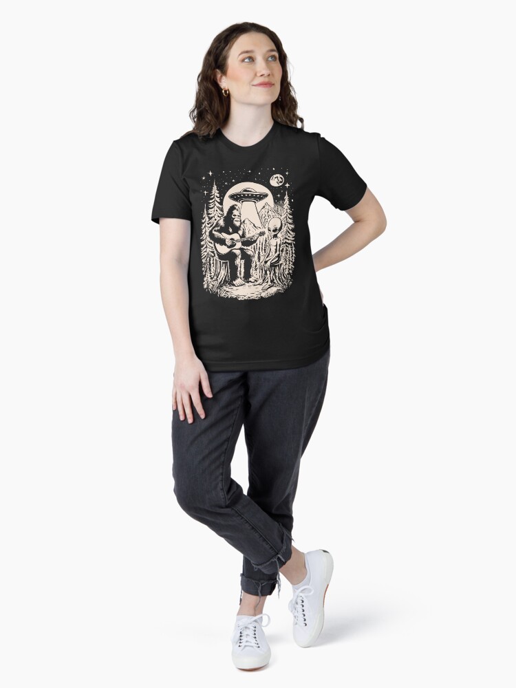 Thumbnail 4 of 7, Essential T-Shirt, Bigfoot Playing Guitar With Alien UFO Vintage Camping designed and sold by CutenessKlub.