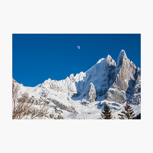 Alpine moon high above the mountains of Chamonix in the French Alps Photographic Print