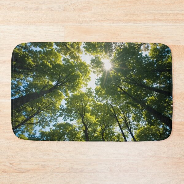 Item preview, Sunlight filters through the lush green canopy of a dense forest designed and sold by InezPhotography.