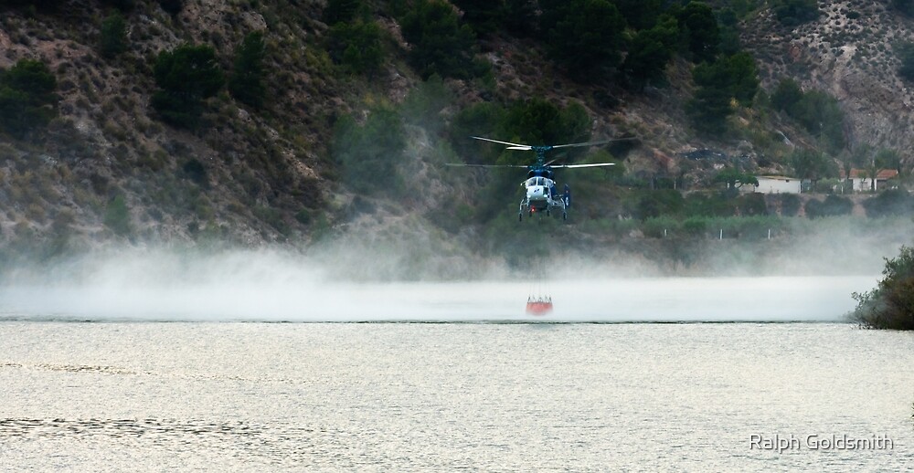 "Fire Fighter Helicopter Picking Up Water in the spray" by Ralph