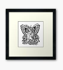 Young girl butterfly with long wavy hair falling to the ground. Nude modest moth. Princess of the forest. Framed Print