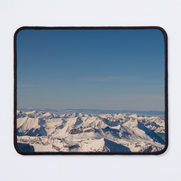 Item preview, Aerial View over the Snowcapped Mountain Peak in the Swiss Alps in a Sunny Winter Day designed and sold by Mats Silvan.