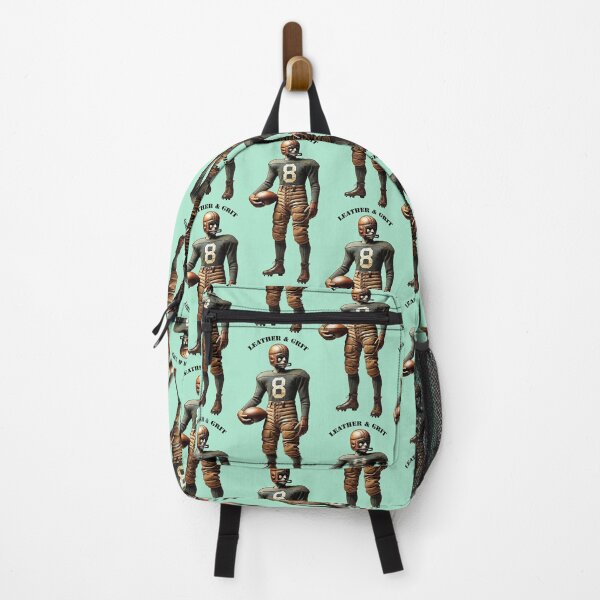 Item preview, Vintage Early 1900s Football Player with a Leather Helmet and Ball URM designed and sold by urmaddad.