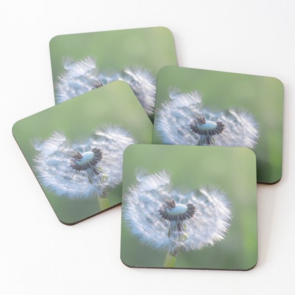Item preview, Dandelion with seeds blowing away in the wind across a clear greenery designed and sold by Teqmi-images.