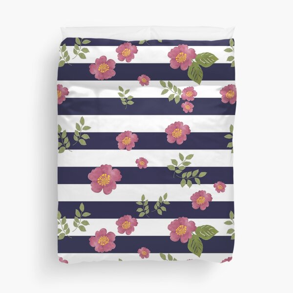 Floral pattern of leaves and flowers of pink petals and yellow stamens Duvet Cover