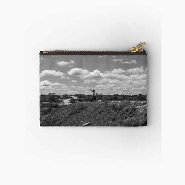 Item preview, woman throwing a stone into the water designed and sold by felipequeiroz.