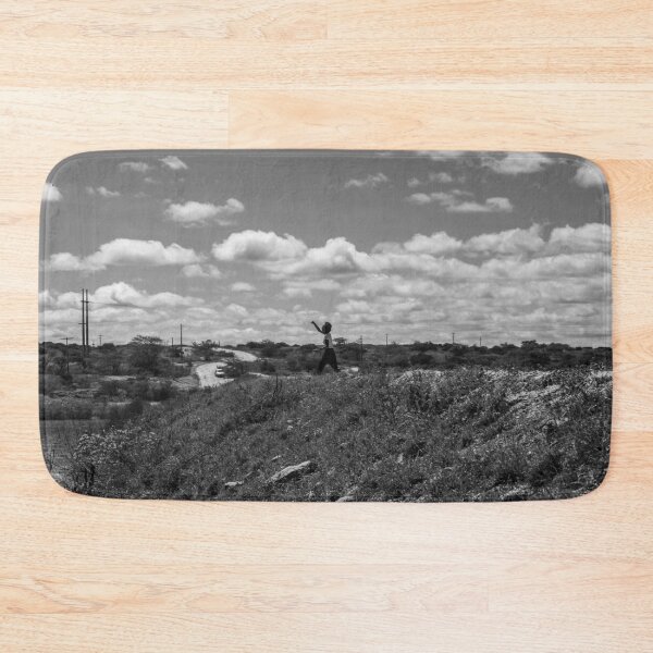Item preview, woman throwing a stone into the water designed and sold by felipequeiroz.