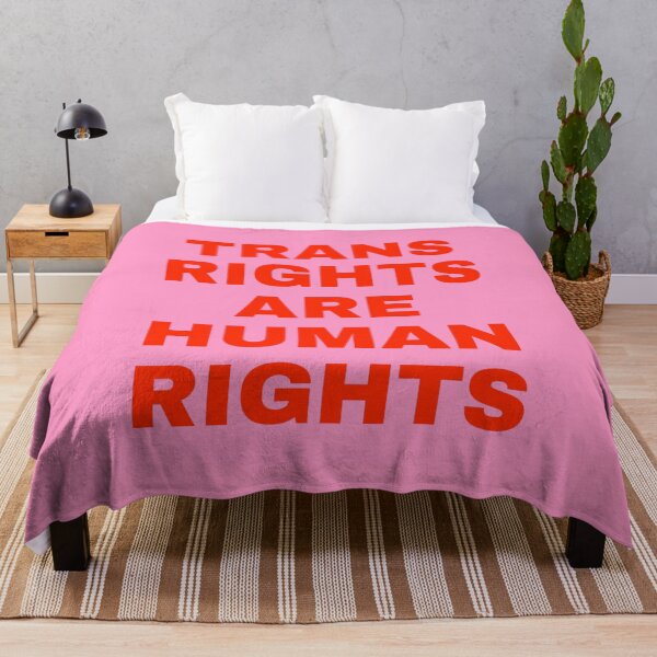 Item preview, Trans Rights are Human Rights Bold Red Text on Pink Background designed and sold by spooniecentral.