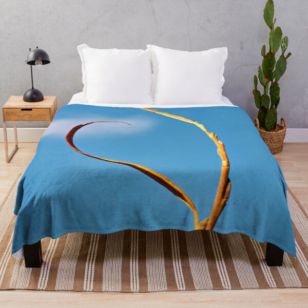 Item preview, Lonely blade of grass against a blue sky – simple beauty of nature designed and sold by beatbieri.ch.