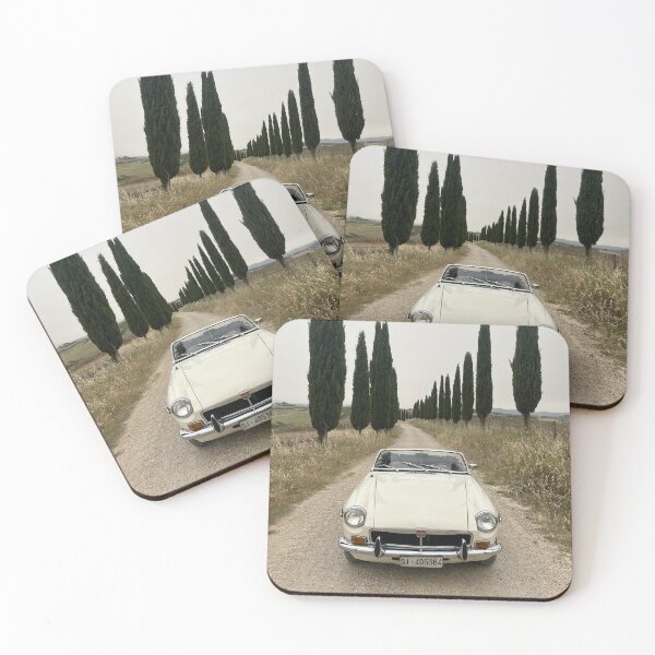 Item preview, MG MGB ina a field in Tuscany, surrounded by cypress, italian style travel car designed and sold by SpaceCars.