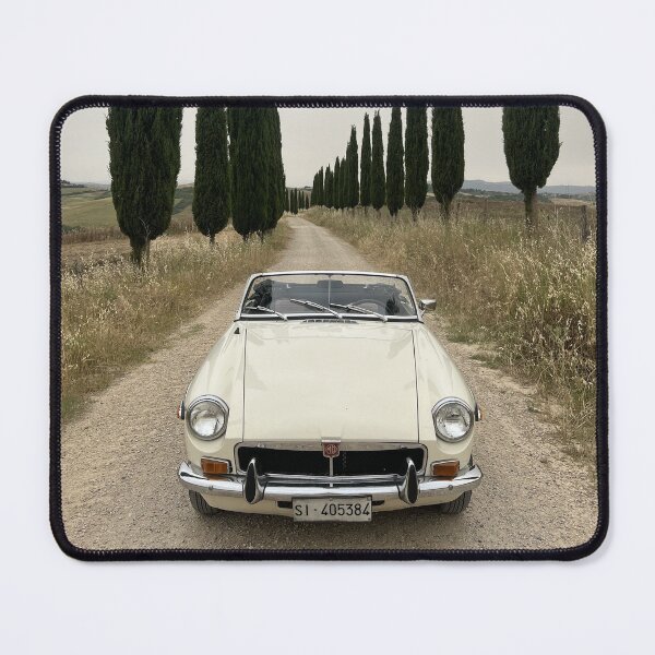 Item preview, MG MGB ina a field in Tuscany, surrounded by cypress, italian style travel car designed and sold by SpaceCars.
