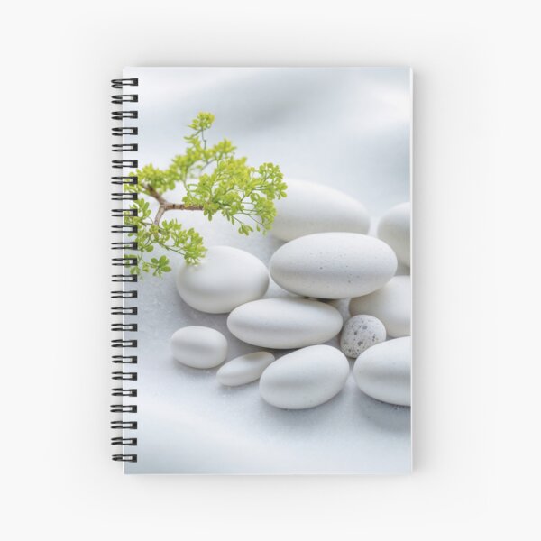 Smooth White Stones and a Small Growing Green Plant Spiral Notebook
