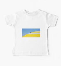 Ladybug climbing over beach umbrella Baby Tee