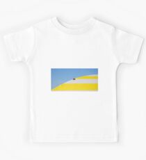 Ladybug climbing over beach umbrella Kids Tee