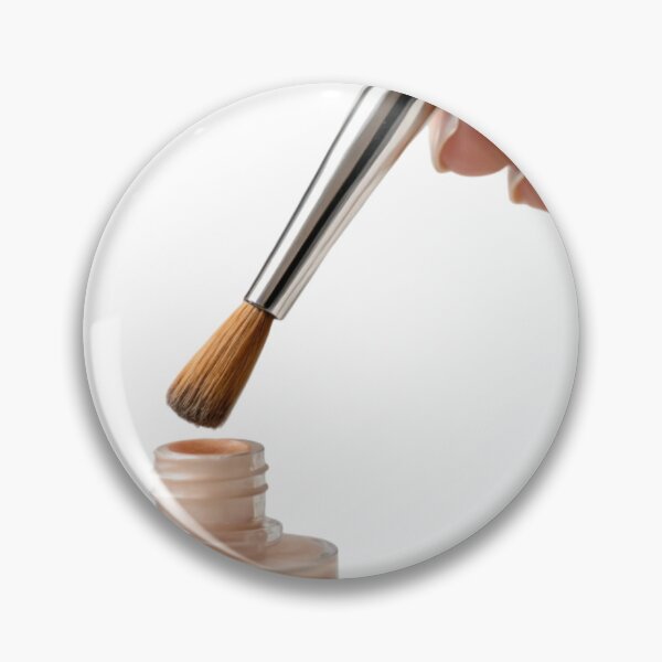 Item preview, Hand Holding Makeup Brush Dipping into Beige Liquid Foundation designed and sold by Creative88Art.