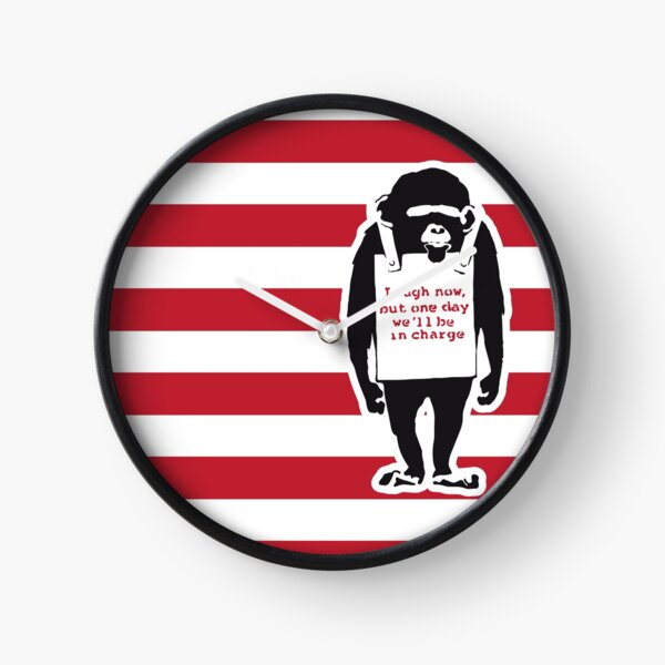Banksy Quote Monkey Chimpanze Laugh Now, but one day we'll be in charge Graffiti Street art with Banksy signature tag and funny red stripes Clock