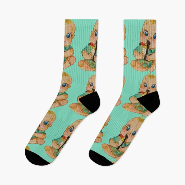 Aperçu de l'œuvre Bébé mignon avec hochet toucan créée et vendue par the little fennec.