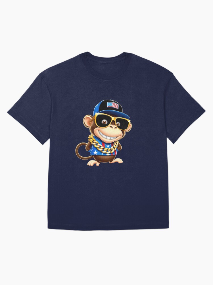 Aperçu 3 sur 7. T-shirt oversize avec l'œuvre whimsical cartoon monkey, with a mischievous grin and bright créée et vendue par 1onemarket.