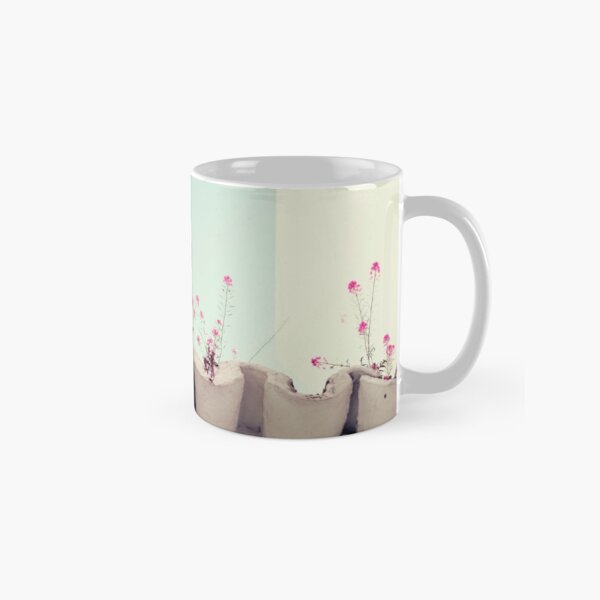 Pink flowers on the white rooftop Classic Mug