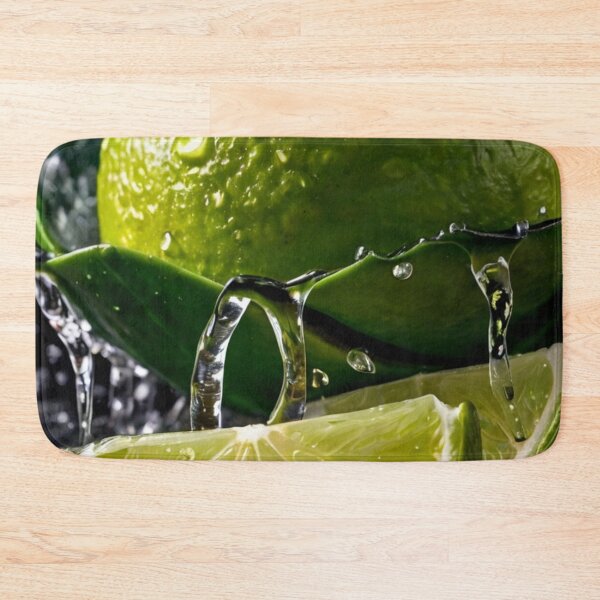 Item preview, high definition close up image of  lime slices and an intact lime against a black background. designed and sold by optimusprime39.