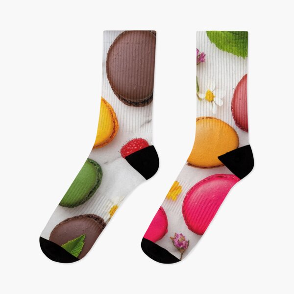 Item preview, Colorful macarons spread on a table designed and sold by anytka.
