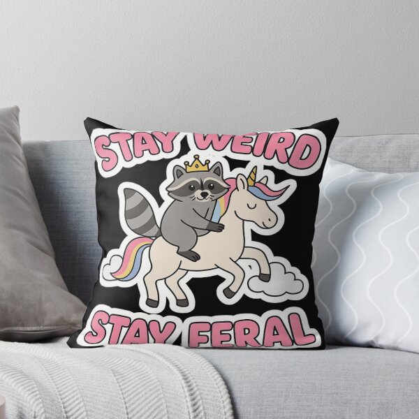 Item preview, Stay Weird Stay Feral – Raccoon on a Unicorn Cartoon Sticker designed and sold by TrashCultSupply.
