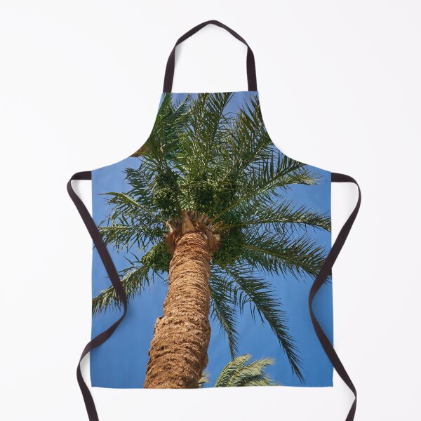 Item preview, date palm growing against blue sky designed and sold by IgorKovalenko.