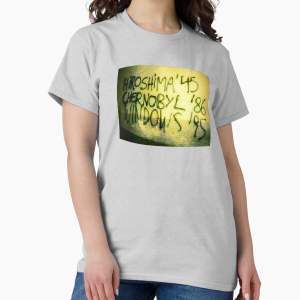 Item preview, "CATASTROPHES" HIROSHIMA '45 CHERNOBYL '86 WINDOWS '95 SCHIZOPOSTING GRAFFITI 1999 POMO ART TRIBLEND-(GREEN)TEE--DRAWSTRING-SOCKS-ACRYLIC-CLOCK designed and sold by CARTOONETELIER.
