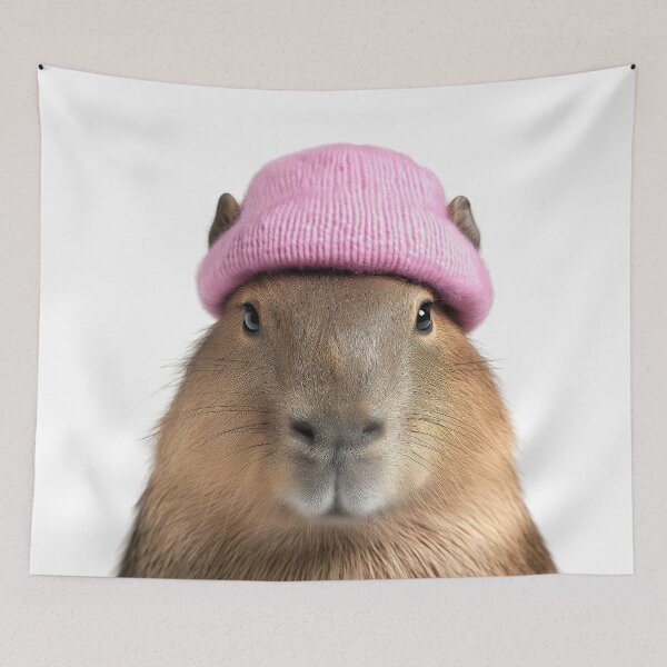 Item preview, Cozy Capybara Wearing Pink Winter Hat Trendy Animal Fashion Artwork designed and sold by LazyOwlStore.