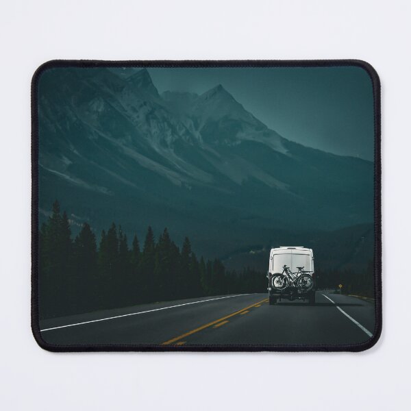 Item preview, Van with a bike on the back is driving down the mountain road designed and sold by InkinZ.