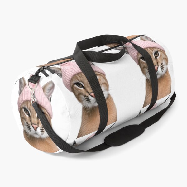 Item preview, Cozy Caracal Wearing Pink Winter Hat Trendy Animal Fashion Artwork designed and sold by LazyOwlStore.