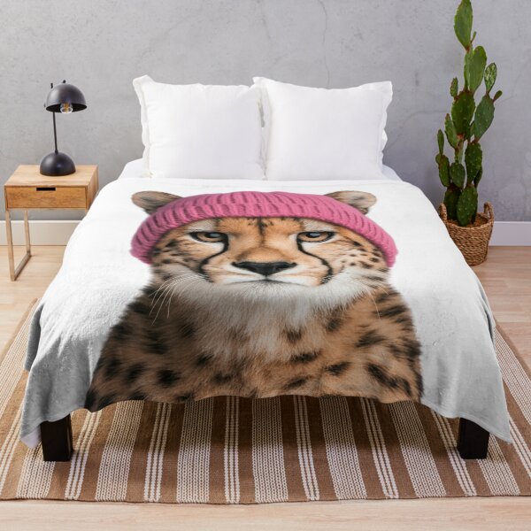 Item preview, Cozy Cheetah Wearing Pink Winter Hat Trendy Animal Fashion Artwork designed and sold by LazyOwlStore.