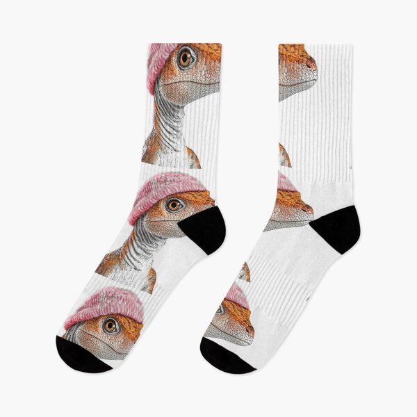 Item preview, Cozy Dinosaur Wearing Pink Winter Hat Trendy Animal Fashion Artwork designed and sold by LazyOwlStore.