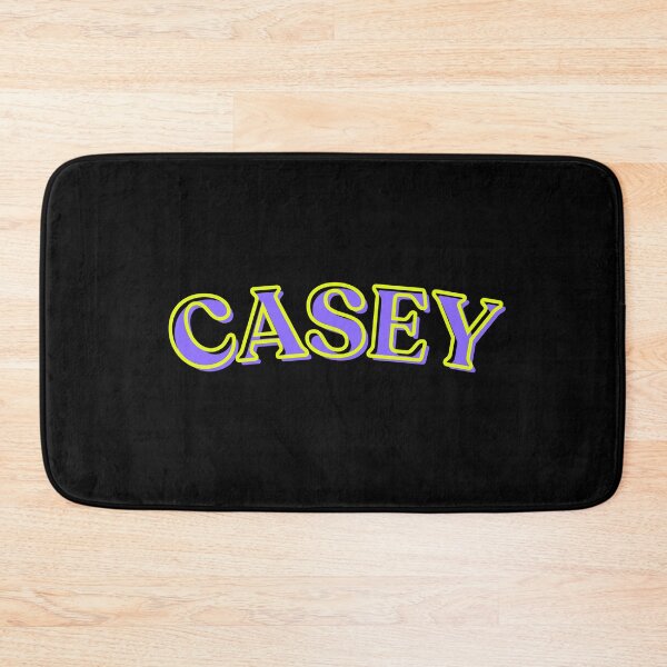 Item preview, “CASEY” Bold Purple & Yellow Text Graphic on Black Background designed and sold by larissa-myrie.
