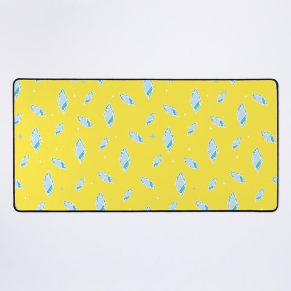 Magic blue crystal on yellow background Desk Mat