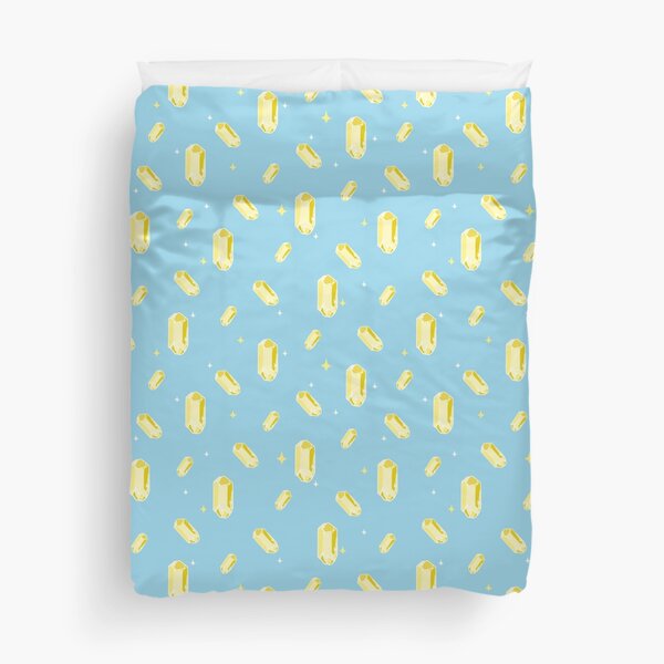 Magic yellow crystal on blue background Duvet Cover