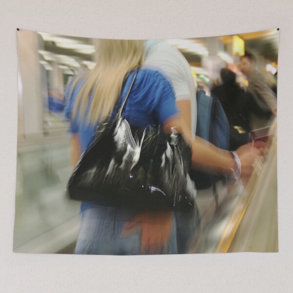 Item preview, Blurred photo of people on electiric walkway in airport designed and sold by Photopat.
