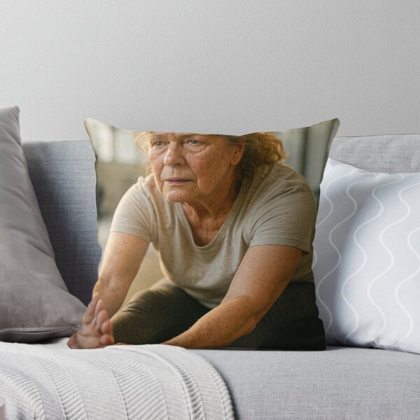 Item preview, Senior Woman Stretching in Natural Light Gym designed and sold by soulofalion.