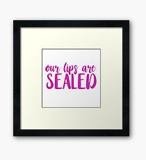 our lips are sealed. Framed Print