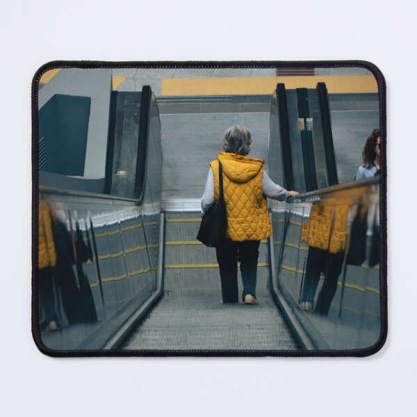 Item preview, lady with yelloww jacket on an escalator designed and sold by Buhtar.