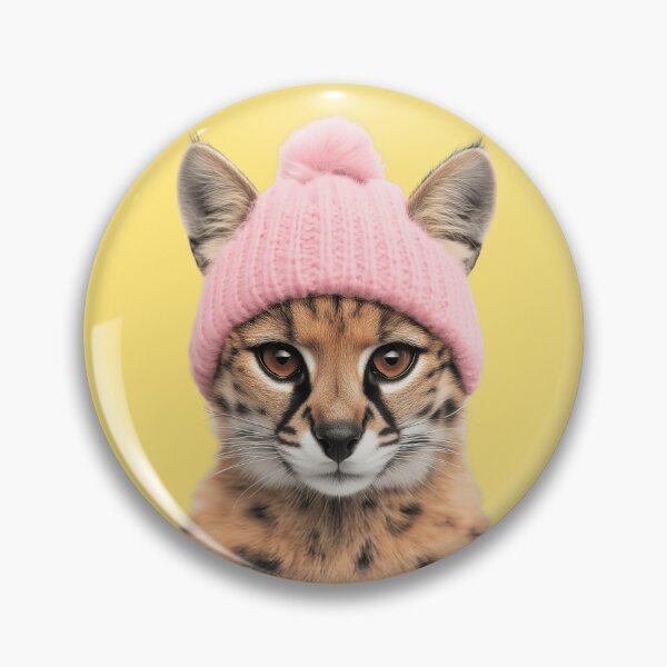Item preview, Cozy Serval Wearing Pink Winter Hat Trendy Animal Fashion Artwork designed and sold by LazyOwlStore.