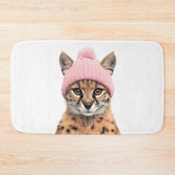 Item preview, Cozy Serval Wearing Pink Winter Hat Trendy Animal Fashion Artwork designed and sold by LazyOwlStore.
