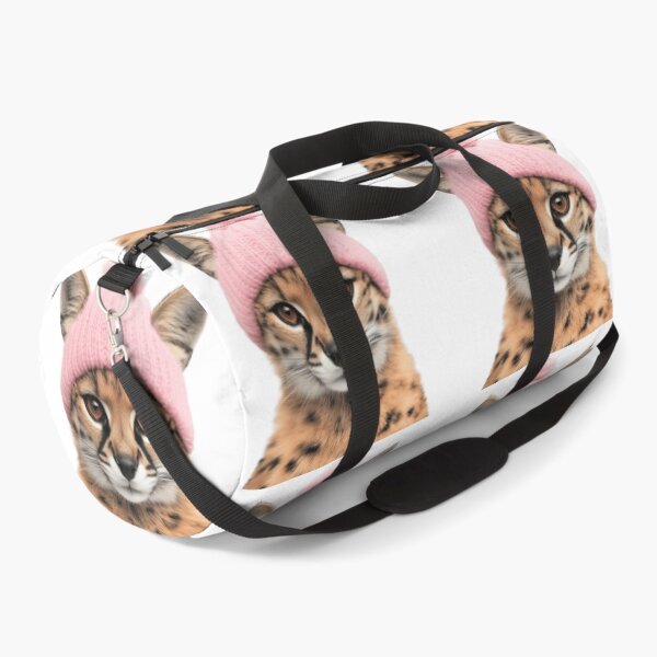 Item preview, Cozy Serval Wearing Pink Winter Hat Trendy Animal Fashion Artwork designed and sold by LazyOwlStore.