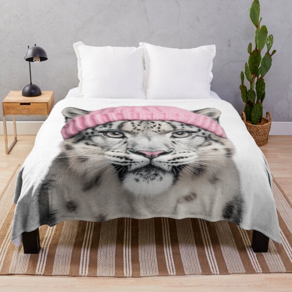 Item preview, Cozy Snow Leopard Wearing Pink Winter Hat Trendy Animal Fashion Artwork designed and sold by LazyOwlStore.