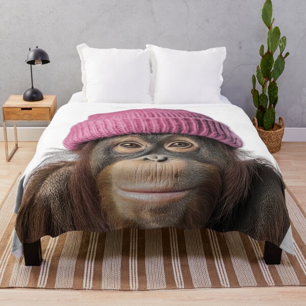 Item preview, Cozy Orangutan Wearing Pink Winter Hat Trendy Animal Fashion Artwork designed and sold by LazyOwlStore.