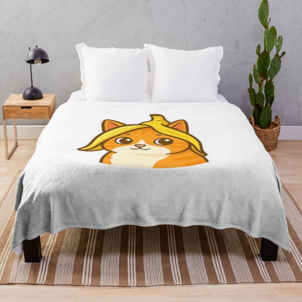 Item preview, Orange Cat with Banana Peel Hat Sticker designed and sold by Wandertrace.