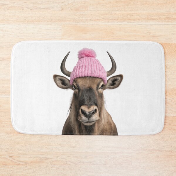 Item preview, Cozy Wildebeest Wearing Pink Winter Hat Trendy Animal Fashion Artwork designed and sold by LazyOwlStore.